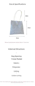 Detailed size specifications for light blue floral tote bag with white braided handles