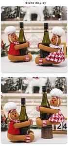 Detail of gingerbread man wine bottle covers with red vest and checkered skirt for Christmas