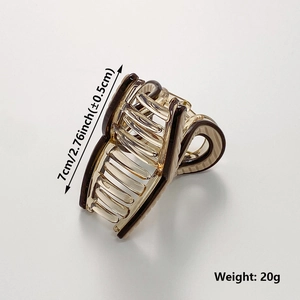 7cm brown striped plastic hair claw clip for kids on white background with 20g weight
