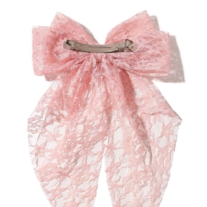 Elegant large pink floral lace bow hair clip with a secure silver metal spring clasp