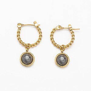 Detail of gold twisted hoop earrings with round grey natural stone pendants