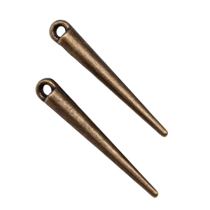Macro detail of bronze spike cone charms for DIY jewelry making with hanging loops