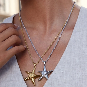 Elegant gold and silver starfish pendant necklaces with textured spiral design on twist chains