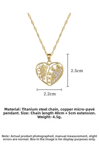 Macro view of a gold heart pendant with religious relief and shimmering zircon stones