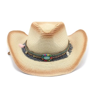Western straw cowboy hat for women with bohemian beaded band and turquoise fringe