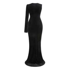 Detail view of the back tailoring and velvet texture on this black fishtail gown
