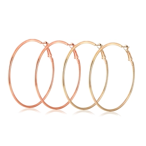 Minimalist large hollow hoop earrings in gold and rose gold with leverback closures