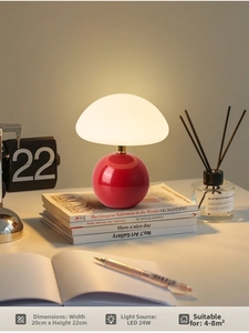 Close-up of a red mushroom lamp with dimensions 20x22cm and warm 24W LED lighting