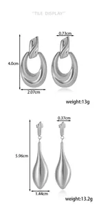 Detailed measurement display for geometric stainless steel earrings with weight info
