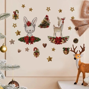 Vue détaillée de stickers muraux de Noël avec lapins et cerfs sur un mur neutre