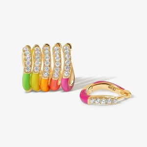Detail of colorful enamel hoop earrings in gold plated S925 silver with sparkling zircon