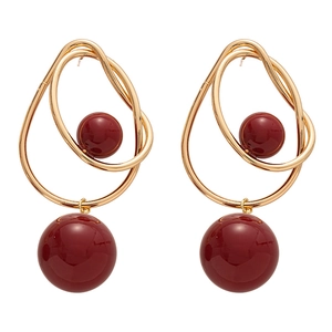 Vintage gold geometric earrings with burgundy acrylic round beads in cross-twisted design