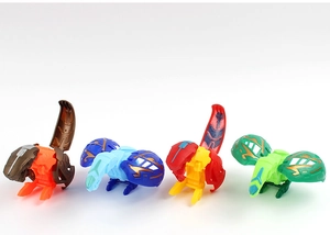 Detail view of four colorful transforming dinosaur egg robot toys in a horizontal row