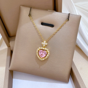 Luxurious gold titanium necklace with pink heart pendant and sparkling crystals