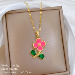 Détails du collier fleur avec spécifications de taille 3x2cm et poids de 4,6g inclus
