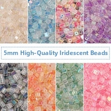 Detail of 5mm iridescent sugar cube glass beads in eight vibrant colors for jewelry making
