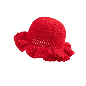 Handmade red crochet knit bucket hat with hollow-out design and wavy ruffled brim