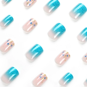 Lake blue glitter and floral gold foil press-on nails in square shape on white backdrop