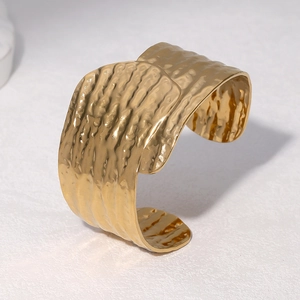 Classic 18k gold plated stainless steel cuff bracelet with hammered texture finish