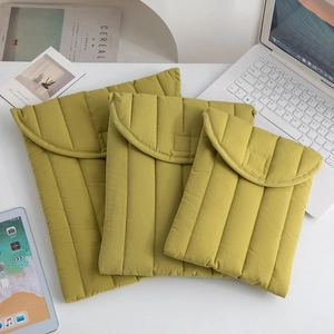 Three-piece quilted olive green padded laptop and tablet sleeve set in three sizes