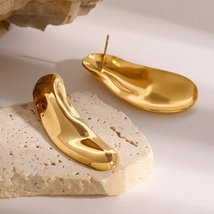 Polished 18k gold plated chunky teardrop stud earrings on stone background