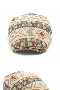 Detail of ethnic geometric jacquard weave on vintage tweed newsboy cap for men and women
