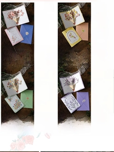 Detail of 3D pop-up floral cards with envelopes featuring lilies and tulips