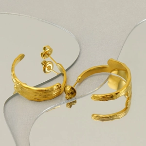 18k gold plated stainless steel C-shaped earrings with irregular textured finish