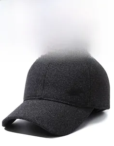 Detailed view of dark grey baseball cap featuring premium wool blend texture and side logo