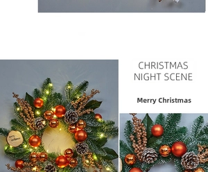 Close-up of Christmas wreath with warm LED lights, pine cones, and orange ornaments