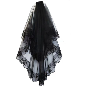 Elegant multi-layered black bridal veil with delicate lace edges on a white background