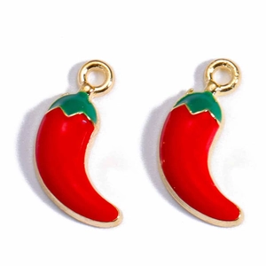 Close-up of two red chili pendants with green stems and gold loops for jewelry DIY