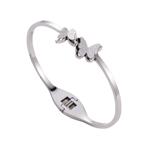 Minimalist silver butterfly open spring bangle with polished and frosted finish