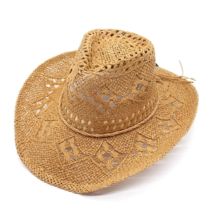 Detailed close-up of hollow woven texture on a breathable straw cowboy jazz hat