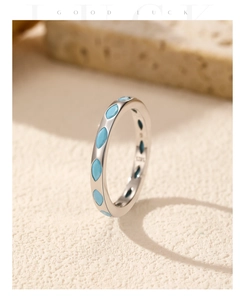 Macro detail of S925 sterling silver ring with turquoise stone and S925 engraving
