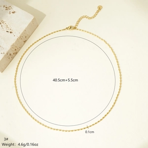Detailed view of oval bead chain necklace with adjustable lobster clasp and 5.5cm extension