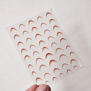 Detail view of TO 4445 ultra-thin red French gradient nail stickers for DIY manicure art