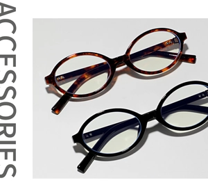 Detail of oval retro Y2K glasses in tortoiseshell and black finish acetate frames