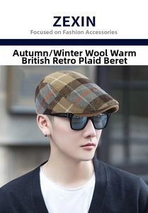 Close-up of a retro plaid wool beret hat in brown and orange tones for winter warmth