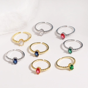 Adjustable oval gemstone rings in gold and silver finish with multi-colored crystals
