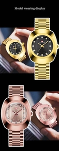 Close-up of gold diamond-encrusted quartz watch with date display and metal band