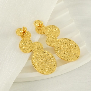 Lava style 18K gold plated stainless steel earrings with triple textured disc design