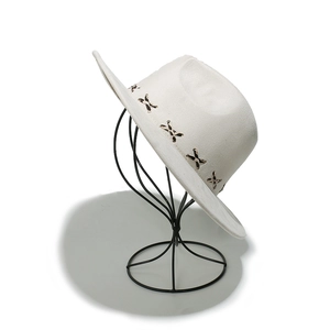 Detail of white suede jazz hat featuring leopard print cross-stitch decorative band
