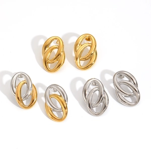 Detailed view of interconnected oval hoop earrings in gold, silver and mixed finishes
