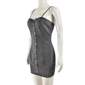Detail of grey washed denim mini dress featuring front button placket and slim straps