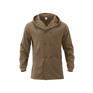 Detail of camel hooded double-breasted coat showing thick cotton texture and side pockets