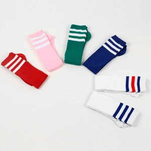 Flat lay of colorful striped knee high athletic socks in a multi-pair assortment set