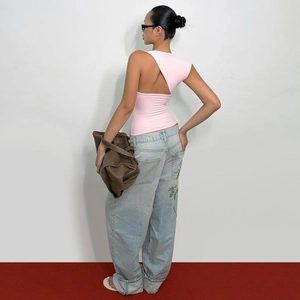 Detailed back view of pink slim fit tank top featuring asymmetric cutout open back design