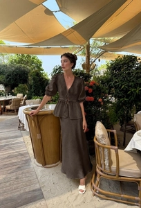 Deep brown V-neck ruffle top and high-waisted maxi skirt set with a French vacation vibe