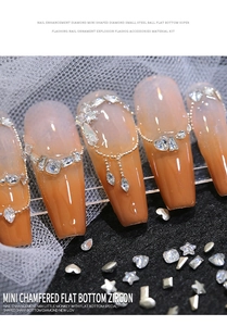 Detailed view of mini flat-bottom zircons and steel balls for nail art decoration